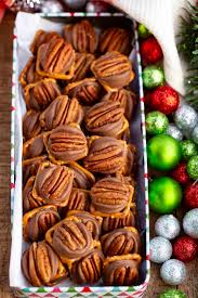 When the chocolate is melted, dip pretzels in the chocolate to cover and set on waxed paper until cool. Pretzel Turtles Dinner Then Dessert
