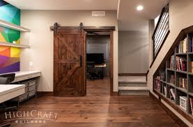 With steven greenstreet, nick pope. Modern Rustic Basement Office Barn Door Bookshelves Highcraft