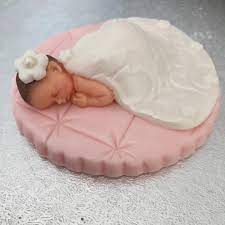 Anita S Cake Bakery Sleeping Baby Cake Topper Wearing A White Christening Dress Laying On A Pink Base Edibles Used Modelling Paste Lustre Dust Edible Balls Rainbow Dust Hobbycrafthq Renshawbaking