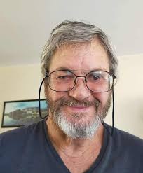 Photo from Christopher Mc Canny, of himself, James Gallen and David Barr  representing the Deaf community at the memorial of Eamonn Mc Devitt a deaf  mute who was murdered by the British