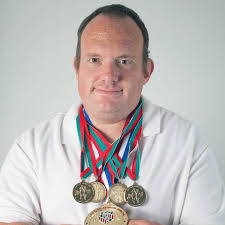 Special Olympian Mayo makes mark in powerlifting career