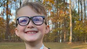 Local boy meets Meteorologist George Flickinger after dressing as him for  Halloween