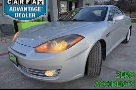Image result for Bright Silver 2000 Tiburon