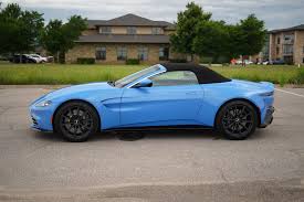Image result for Concours Blue 2021 Aston Martin