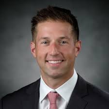 Brendan Bush, JD, CRIS