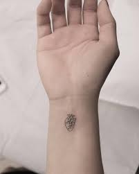 If you want a simple design, then put on a small heart. Anatomical Heart Tattoo On The Wrist