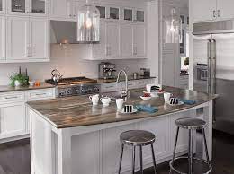 It was a travesty, as you all bemoaned alongside me, but my friend kyle helped me paint it a fresh coat of white, remove the broken glass knobs, and replace them with new ceramic ones. 180fx Dolce Macchiato Laminate Laminate Kitchen Kitchen Remodel Small Kitchen Design Centre