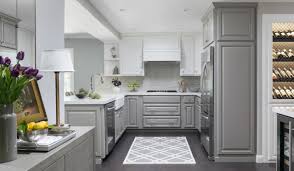 kitchen lightens up with two tone cabinets