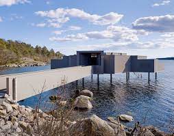 So i booked for the 4. White Arkitekter S Pared Back Bathhouse Reinterprets Sweden S Traditional Gingerbread Architecture
