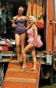 Two Alluringly Attired 1950s Circus Performers Posing Outside Of A Wardrobe Wagon Love The Itty Bitty Chihuahua T Circus Performers Circus Costume Circus Girl