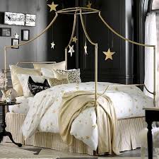 Boho bedding focuses on spirited embellishments (think: The Emily And Meritt Gold And White Scattered Star Duvet Cover And Sham