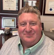 What are the names of the people in the band photo?