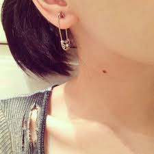 Gothicbuzz Stars With Gothic Fashion Sense The Chrome Hearts Way Chrome Hearts Cross Safety Pin As Chrome Hearts Earring Chrome Hearts Safety Pin Earrings