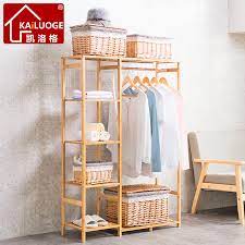 We've compiled the most stylish clothes racks and rails for your home, whether you want a freestanding rack for the hallway to store coats and shoes, or an additional unit for your bedroom. Buy Kellogg Cabinet Simple Wooden Coat Rack Hanger Floor Bedroom Clothes Rack Storage Rack Bedroom In Cheap Price On Alibaba Com