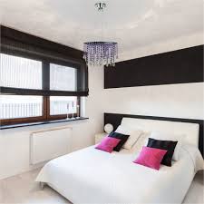 Wrought iron base suffers the pressure from fixure. Small Room Crystal Chandelier Ideas Glow Lighting