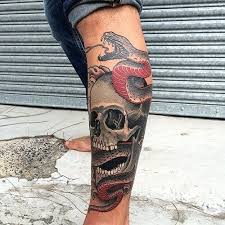 Snakes are perfect tattoo subjects, don't you agree? 15 Traditional Skull And Snake Tattoos Petpress