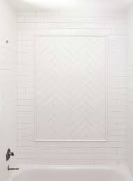 Extending from the sink to the tub surround, this bathroom's white herringbone tile seamlessly ties the space together. How To Tile A Herringbone Pattern Craving Some Creativity