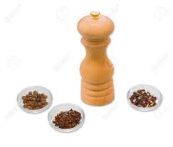 White pepper is made from black peppercorns that have the outer covering removed. Handmade Wooden Mill For Spices Made Of Beech And Small Glass Containers With Black Pepper Pink Peppercorn Wite Pepper Allspice And Clove On A Light Background Isolation Stock Photo Picture And Royalty