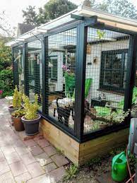 A Beautiful Catio For Indoor Cats Cat Patio Backyard Cat Enclosure