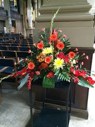 Pin By Neda Fofana On Church Pentecost Sunday Beautiful Flower Arrangements Church Flower Arrangements Flower Arrangements