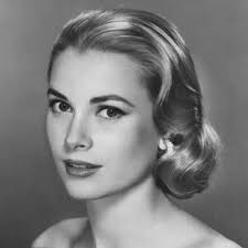 Grace Kelly Observing Sailing Operations by Bettmann