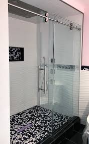 Top Rolling Barndoor Style Door And Stationary Panel Features 3 8 Glass And Stainless Steel Hardware Shower Barn Door Glass Shower Enclosures Glass Shower