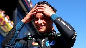 Lando Norris celebrates taking pole position for the Spanish Grand Prix