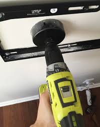 It involves physically cutting holes in your wall to run the cords through, resulting in a setup that looks practically wireless. Clear The Clutter How To Hide Tv Wires And Cords Guest Post From Young House Love Roku