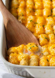 Taco meat casserole with crispy tater tots and smothered with cheddar cheese. Tater Tot Casserole Simply Stacie