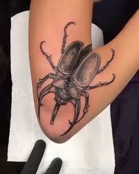 This Elbow Beatle Tattoo Tattoos Beetle Tattoo Bug Tattoo Beetle tattoo designs are very popular and often associated with spiritual significance. tattoos beetle tattoo bug tattoo