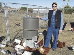 Easiest diy automatic chicken feeder (also solves insomnia)! Farm Show Magazine The Best Stories About Made It Myself Shop Inventions Farming And Gardening Tips Time Saving Tricks The Best Farm Shop Hacks Diy Farm Projects Tips On Boosting Your Farm Income