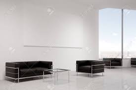 An expansive room calls for a large coffee table to ground it. Side View Of Two Black Armchairs Standing By The Sides Of A Square Coffee Table There Is A Large Horizontal Poster On The Wall Behind Them 3d Rendering Mock Up Stock Photo