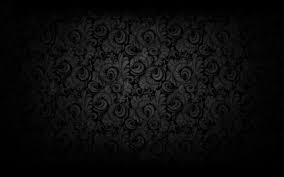This stock motion graphics video shows a luminous liquified black glass showing colorful hues. Black Luxury Background Fade