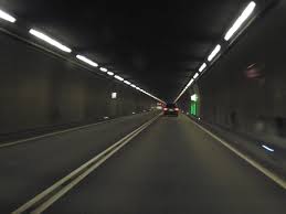 Galleria del san gottardo) is a 15,003 m (49,221 ft) long railway tunnel and forms the summit of the gotthard railway in switzerland. Gotthard Road Tunnel Goschenen Airolo 1980 Structurae