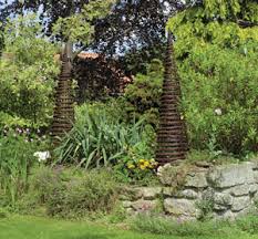 This beautiful support is made of intertwined natural willow branches. Uk Garden Supplies Garden Willow Obelisks
