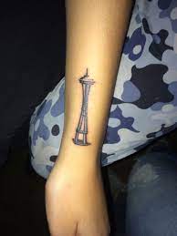 Whether you're seeking your first tattoo or your next custom piece, we're here to serve you. Seattle Space Needle Tattoo Hand Tattoos Tattoos Foot Tattoos