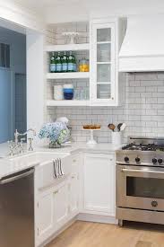 Gorgeous U Shaped Kitchen Features A Pass Through Positioned Above A Peninsula Fitted With White Shak Kitchen Design Small Kitchen Layout Kitchen Remodel Small