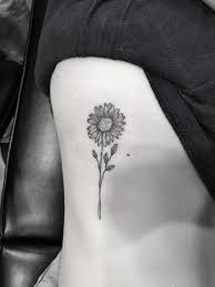 Sunflower Tattoo Flower Tattoo On Ribs Rib Tattoo Small Rib Tattoos