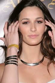 Angel Carter touches her hair at Les Deux