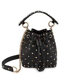 These black leather valentino garavani rockstud ballerina shoes are a classic style from the brand, taking the timeless shape of a ballerina's shoes and toughening them up with the signature rockstud detailing. Best Valentino Rockstud Leather Bucket Bags