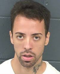 Man allegedly hits ex's friend with baseball bat