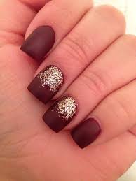 matte burgundy nails with gold glitter