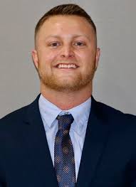 Gilmour names John Carroll assistant Joey Bates new head football coach.