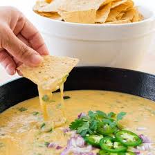 Roasted Poblano Queso Dip Is A Great Way To Snack Grab A Bowlful Of Chips And Dip Into This Creamy Cheesy Dip With A Kick Queso Dip Queso Poblano