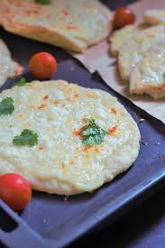 Manaeesh Cheese A Popular Levantine Food Consisting Of Dough Topped With Thyme Cheese Or Ground Meat Similar To Piz Recipes Manakeesh Recipe Cheese Recipes