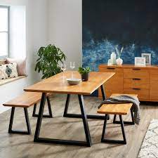 The table, which extends to seat eight with two concealed leaves, has a starburst base of black. Homebase Introducing The Phoenix Dining Table Understated And Perfect For Smaller Spaces Shop Now Https Bit Ly 3pbctlw Facebook