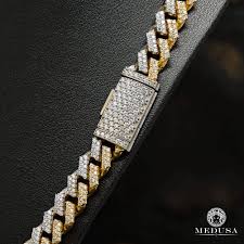 Avec son design original, mais terriblement chic et sexy, cette chaîne de cou plaira autant aux femmes qu'aux hommes. Chaine A Diamants En Or 14k 11mm Cuban Prong Diamant 2 Tons Chaine Bijoux Medusa