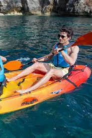 Travel The Coast Of Menorca By Kayak And Dare To Explore The Most Beautiful Sea Caves On The Island Kayaking Menorca Island