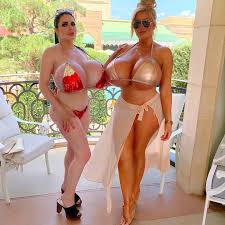 Two Mature Ladies with Massive Juggs in Tiny Bikini