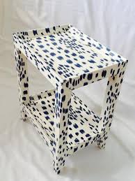 But in spirit, the title is apt, as the book does cover a much broader range of topics than a typical introductory book on mathematical statistics. Karl Springer Style Petite White And Blue Telephone Table